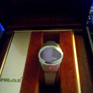 Ladies Silver Tone Pulsar watch